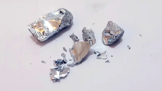 Gallium bar cracked open to show crystal structure
